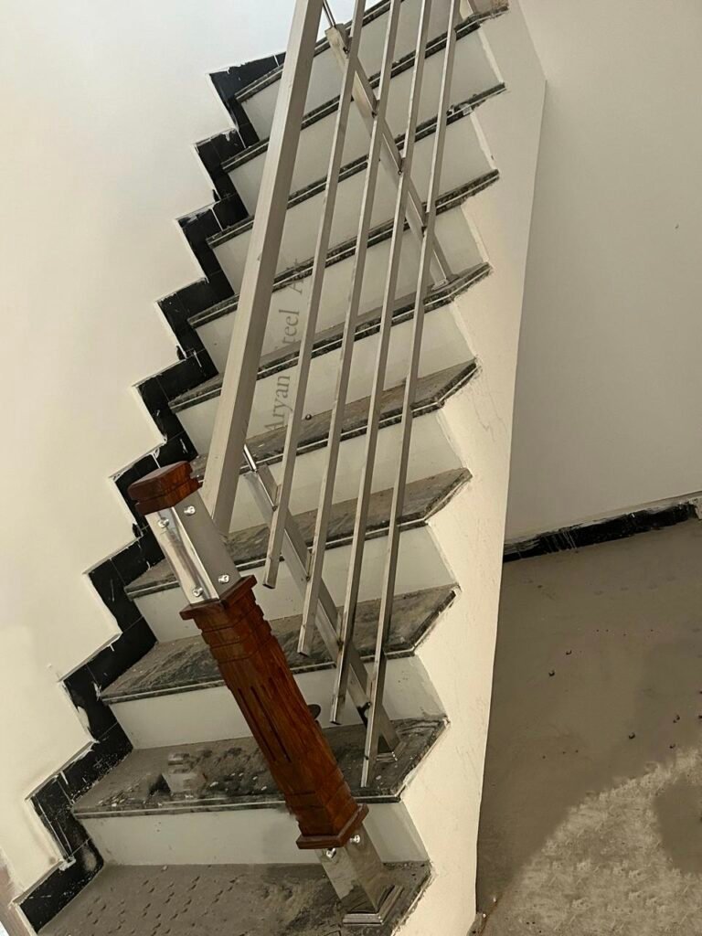 Modern stainless steel staircase railing design for home
